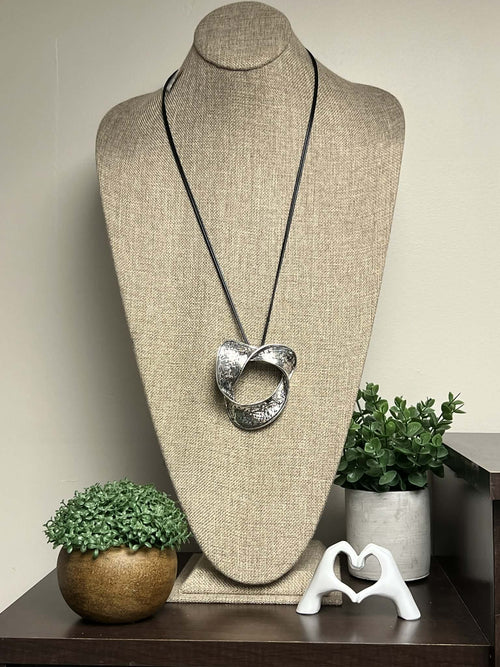 Adjustable String Necklace with Whimsical Circular Pendant